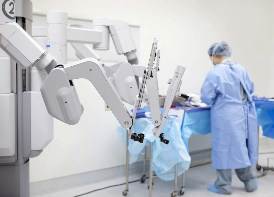 Technician preparing surgical robot Technician preparing surgical robot