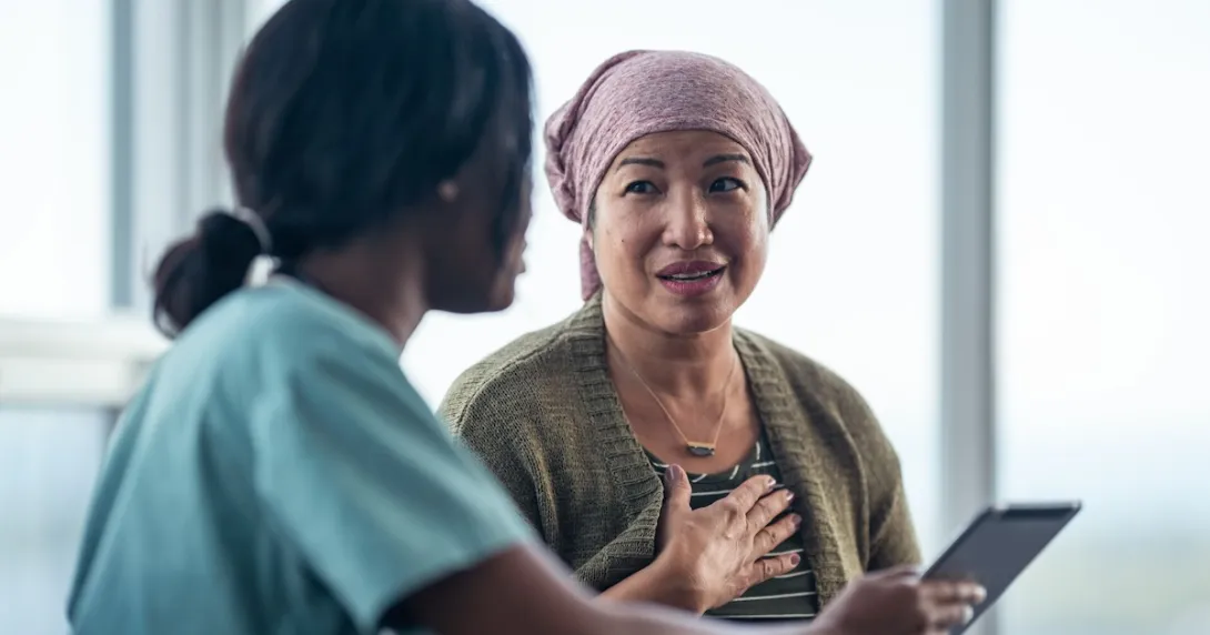 A cancer patient consulting with a doctor