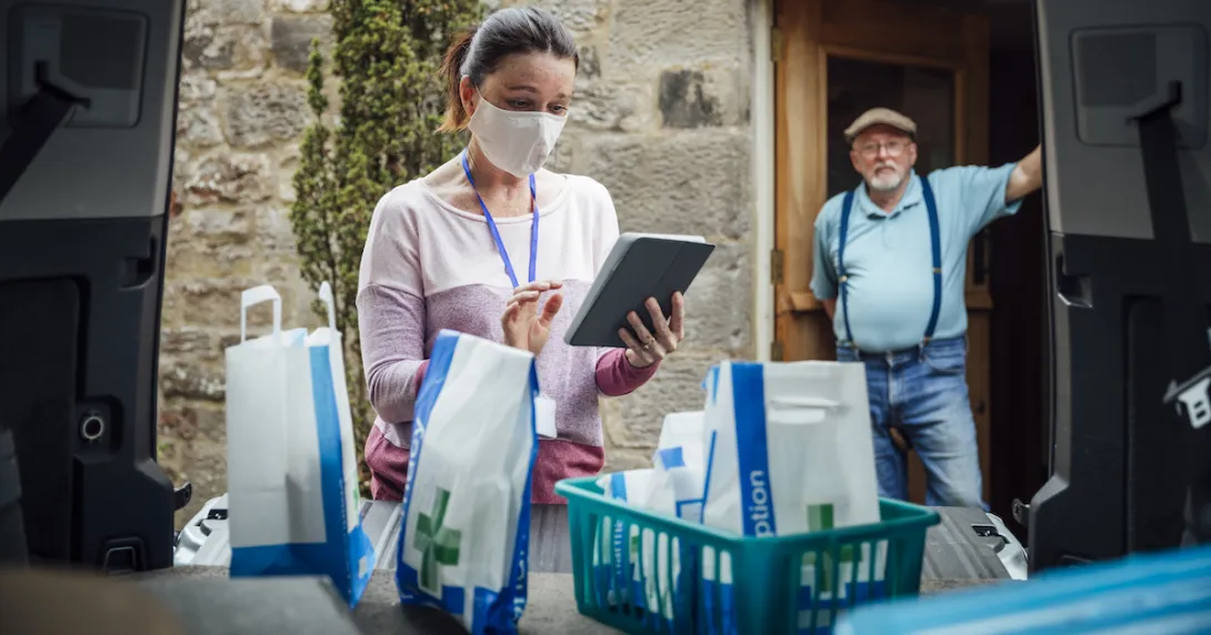 A person delivering medications A person delivering medications