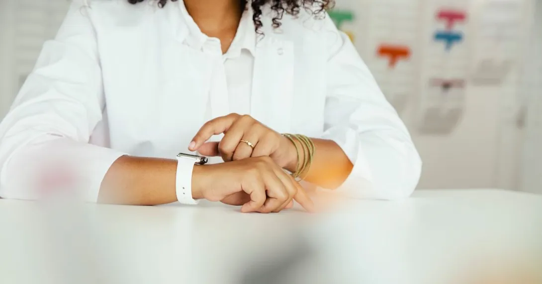A woman using a smartwatch A woman using a smartwatch